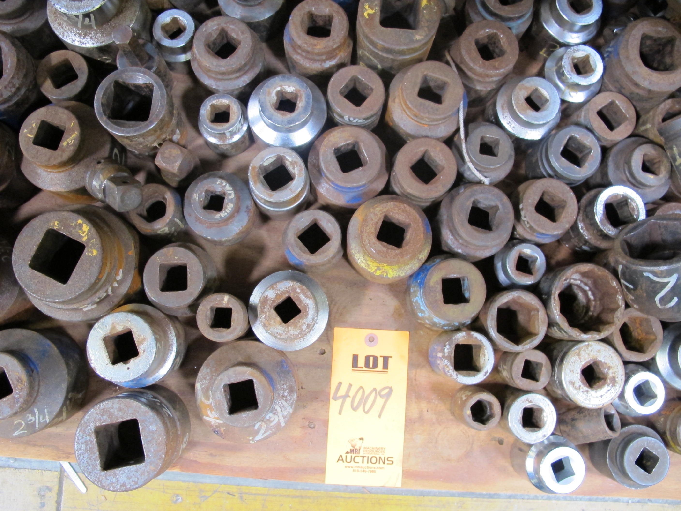 MISC SOCKETS, ADAPTERS, BREAKER BARS, EXTENSION, AND A LARGE RATCHET. LOADING & HANDLING FEE $15-4009